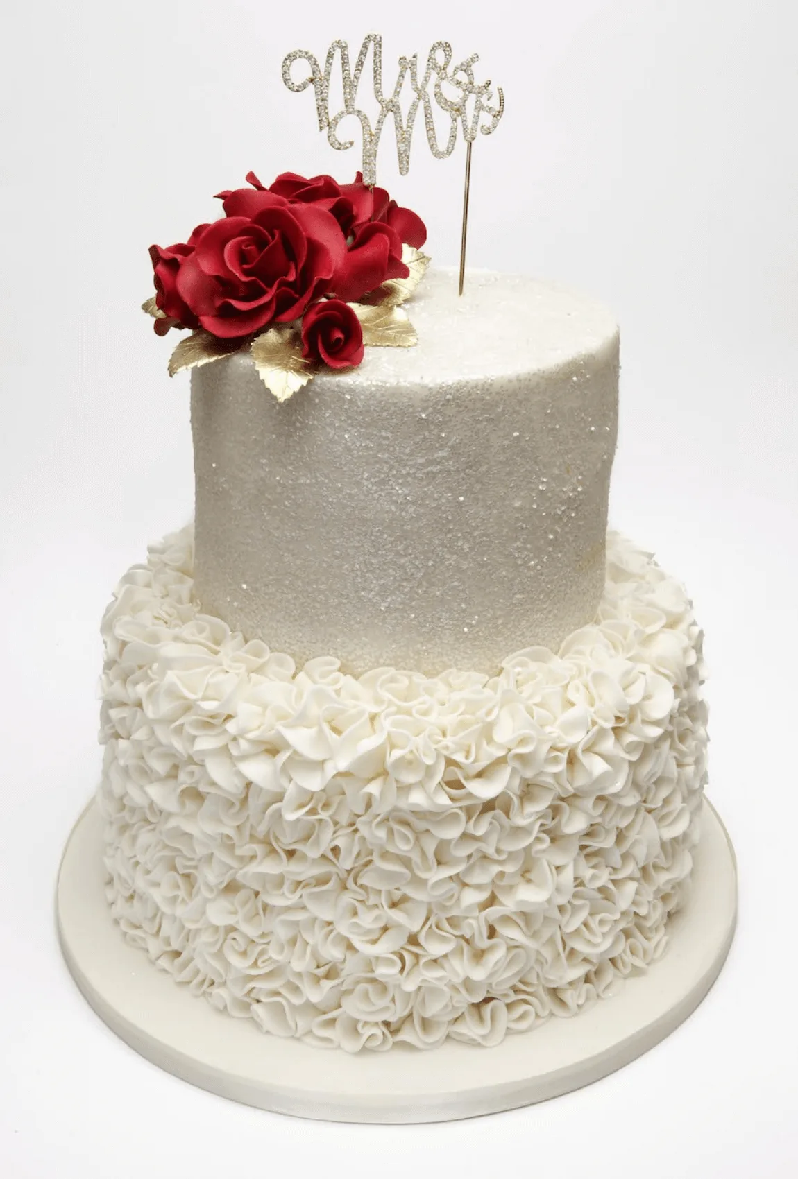 Elegant white bespoke wedding cake with floral details by Anne Robinson, a luxury cake designer in Cambridgeshire – Wedding Cake Design 36