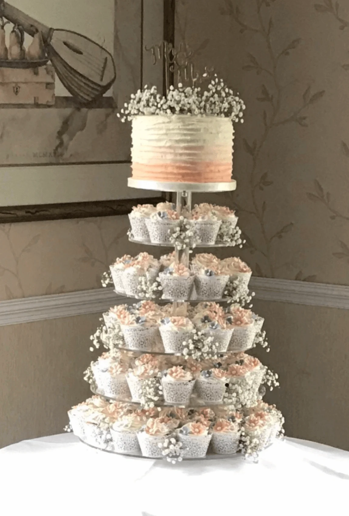 Elegant white bespoke wedding cake with floral details by Anne Robinson, a luxury cake designer in Cambridgeshire – Wedding Cake Design 38